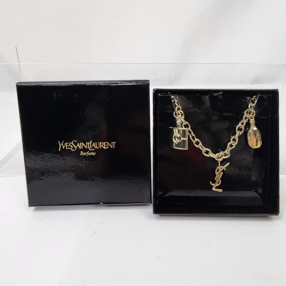 YSL Saint Laurent Gold Tone Charm Bracelet Logo Perfume Bottles NIB - Picture 1 of 8